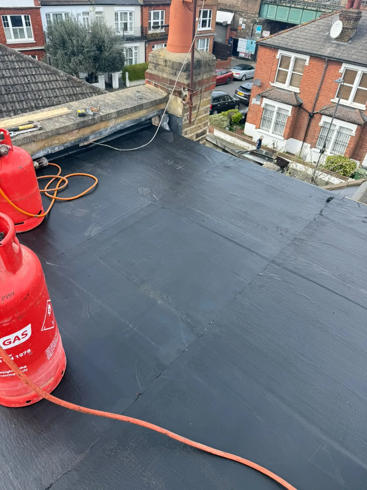 Finished flat roofing membrane installation